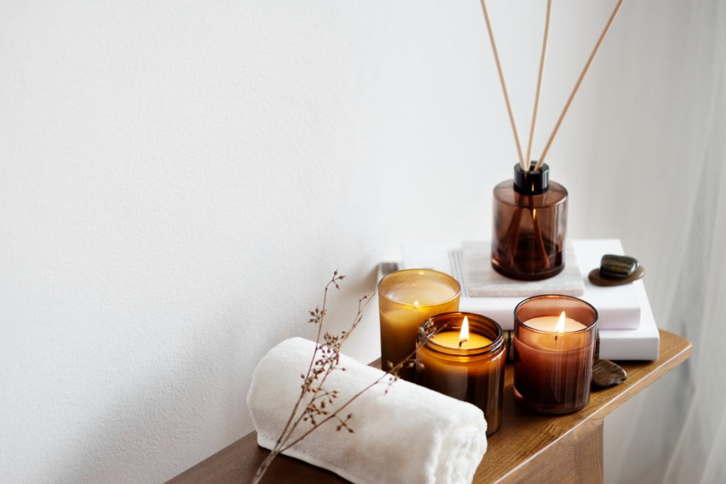 https://www.knightfrank.ie/wp-content/uploads/2022/11/aromatherapy-table-setting-with-scented-candles-towel-1024x683.jpg